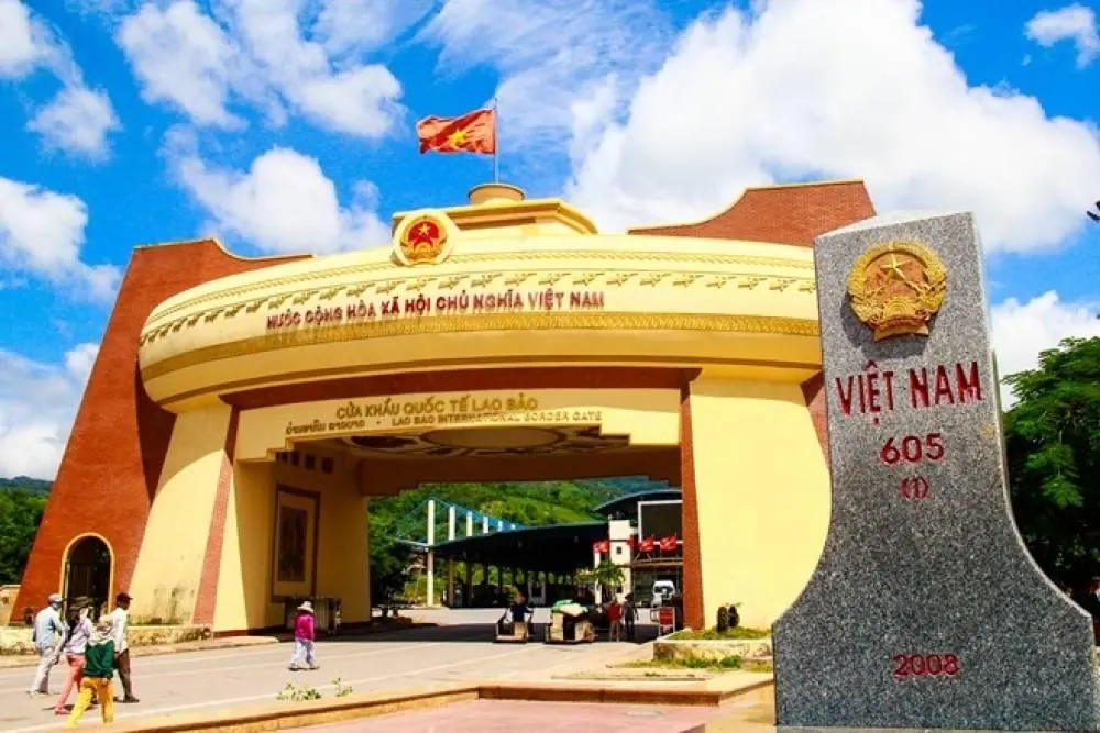 Vietnam border marker 605 in front of the Lao Bao gate