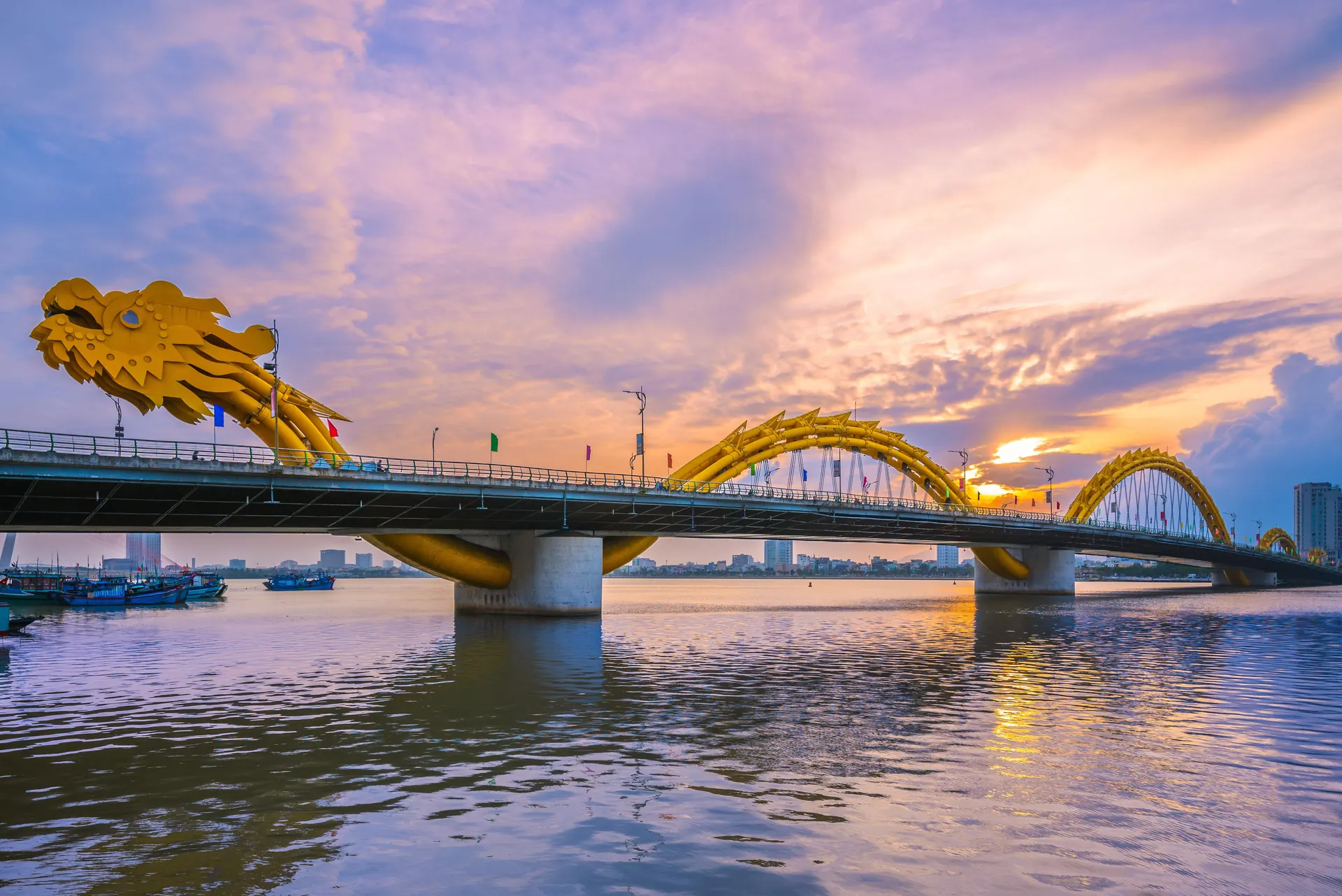 Dragon Bridge over the Han River in Da Nang at sunset